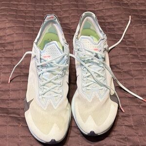 Women’s Nike Vaporfly 4 Carbon Plated running shoe.Size9. Blue and black.